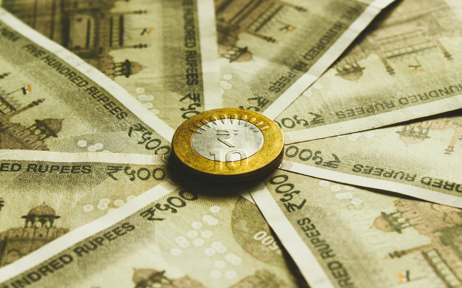 Unsplash finance wallpaper with currency, coin, and banking detail