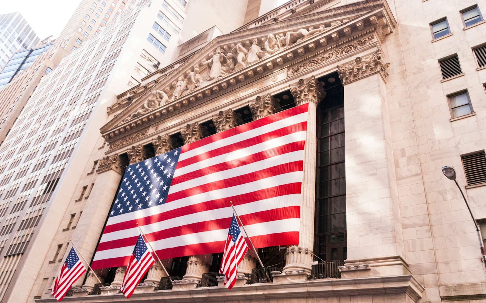 Unsplash capital markets wallpaper with a stock exchange building