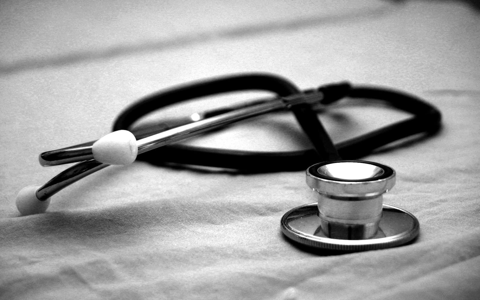 Unsplash healthcare wallpaper with stethoscope and medical care detail