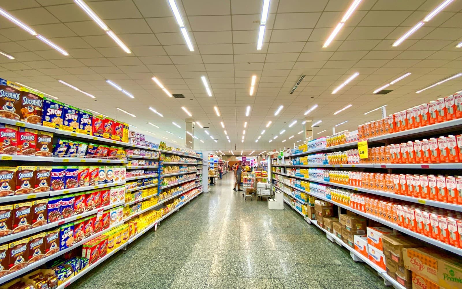 Unsplash retail wallpaper with grocery aisles and merchandise shelves